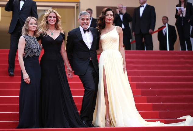 Director Jodie Foster, from left, actors Julia Roberts, George Clooney and Amal Clooney pose for photographers for the screening of the film Money Monster at the 69th international film festival, Cannes, southern France, Thursday, May 12, 2016. (AP Photo/Thibault Camus)