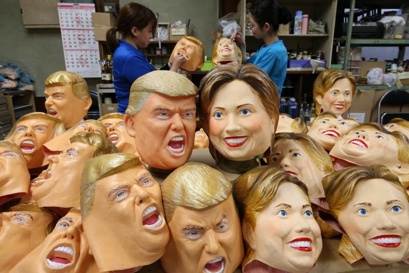 Workers of Ogawa Rubber Inc. are making rubber masks of U.S. Presidentail Republican Donald Trump and his Democratic counterpart Hillary Clinton at its factory in Omiya, Saitama Prefecture on June 9, 2016. Trump and Clinton have run their face deadheat race. ( The Yomiuri Shimbun via AP Images )