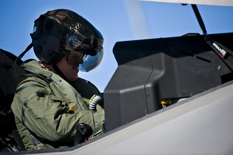 U.S. Air Force Lt. Col Benjamin Bishop, 422nd Test and Evaluation Squadron director of operations, conducts pre-flight checks inside an F-35A Lightning II before a training mission April 2, 2013, at Nellis Air Force Base, Nev.The 422nd Test and Evaluation Squadron will design the tactics for the F-35A. The squadron will also determine how to integrate the F-35A with other aircraft in the Air Force inventory. (U.S. Air Force photo/Senior Airman Brett Clashman)